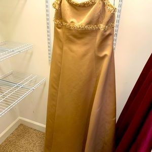 Gold evening gown with beading and corset back